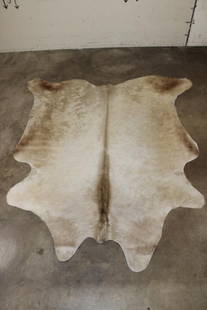 *Brand New* "Champagne" Blonde and Tan COW HIDE: *Brand New* "Champagne" Blonde and Tan COW HIDE. It measures 79" Long x 69" Wide. TAXIDERMY
