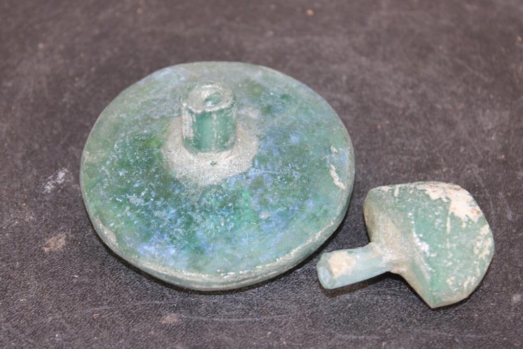 (2) Ancient ROMAN GLASS Bottles from the Roman Empire (ONE$): 2 Beautiful Ancient Roman Glass Bottles. The larger bottle measure 2 5/8" in diameter x 1.5" Tall and weighs 90 g. The smaller bottle measures 1 5/8" Tall x 1 3/8" Wide and weighs 19 g. Roman glass da