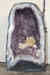 XXL 100 lb AMETHYST CRYSTAL GEODE CATHEDRAL with a Clear Quartz Cluster: XXL AMETHYST CRYSTAL GEODE CATHEDRAL with a Clear Quartz Cluster from Brazil. It measures 19.75" Tall x 11.75" Wide x 9.5" Depth and the Total Weight is 100.75 lbs or 45.8 kg. ROCKS MINERALS FOSSILS&n