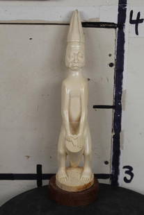*TEXAS RESIDENTS ONLY* Hand-carved African ELEPHANT IVORY Statue of a Man playing a Drum: *TEXAS RESIDENTS ONLY*! Hand-carved African ELEPHANT IVORY Statue of a man playing a drum. He stands proudly on a circular wooden base. It has been brought back from Nigeria. AFRICAN ART and ARTIFACTS