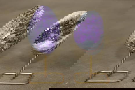 (2) Natural AMETHYST Crystal Clusters on Metal Stands (ONE$): 2 lovely natural AMETHYST Crystal Clusters on metal stands. The Amethysts measure 2.5" Tall x 1.75" Wide with a Total Height of 4" Tall and 2.75" Tall x 2" Wide with a Total Height of 4.25" Tall. The