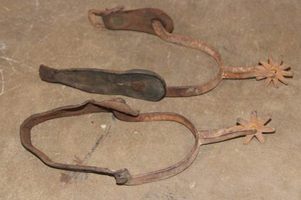 Antique SPURS with a Flower design embossed on the Leather Straps