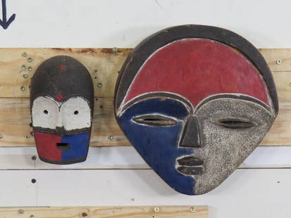 (2) Wooden AFRICAN MASKS, Hand Carved and Painted (ONE$): 2 Wooden AFRICAN MASKS, Hand Carved & Painted. Larger is 11.5"x12" and smaller mask 5"x 9" (ONE$). COLLECTIBLE AFRICAN ART