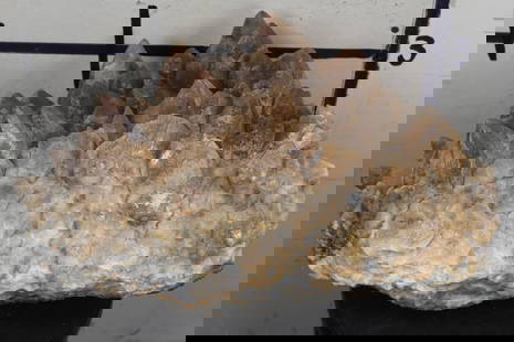 XXL 62lb 10oz Smokey and Honey Dogtooth CALCITE Crystal Cluster Formation: XXL 62lb 10oz Smokey and Honey Dogtooth CALCITE Crystal Cluster Formation. 18" Long x 11.5" Wide x 10" Tall. ROCKS FOSSILS MINERALS