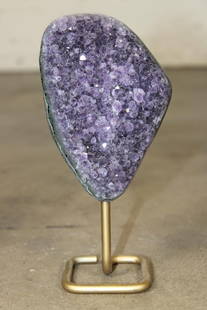 Deep Purple Druzy AMETHYST Crystal Cluster on a Metal Stand: Deep Purple Druzy AMETHYST Crystal Cluster. It has a polished edge and is mounted on a Metal Stand. The Amethyst measures 5" Tall x 3.5" Wide and the Total Mount measures 7" Tall. Amethyst has been va