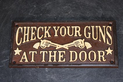 "Check Your Guns at the Door" Cast Iron Sign