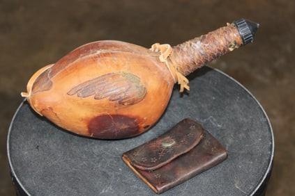 (1) Antique Leather Key Holder and (1) Vintage Leather Covered Duck Shaped Wine Bottle (ONE$)