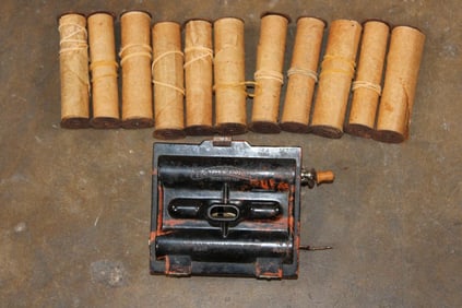 Antique 1928 Rolmonica and 11-Rolmonica Music Rolls