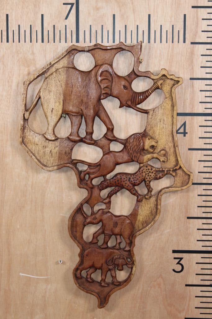 "Big 5" Hand-carved Wood Africa Shaped Wall Decor: "Big 5" Hand-carved Wood Africa Shaped Wall Decor. It measures 23" Tall x 15" Wide. The Total Weight is 1 lb 2 oz. DECORATIVE AFRICA DECOR