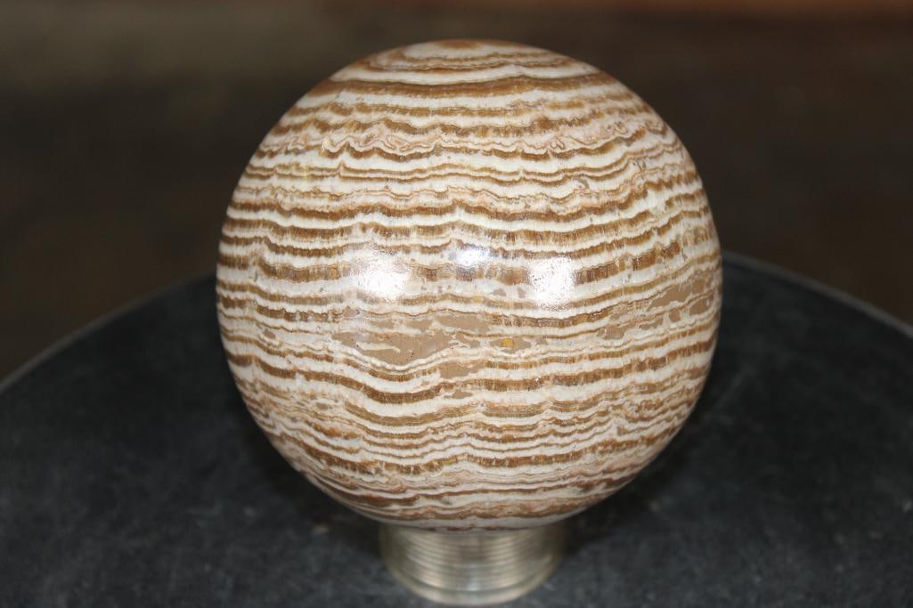 Big BANDED ARAGONITE Mineral Sphere: Big BANDED ARAGONITE Mineral Sphere. It measures 4.5" in Diameter and Weighs 4 lbs 5 oz. The metal stand is not included. ROCKS FOSSILS MINERALS 