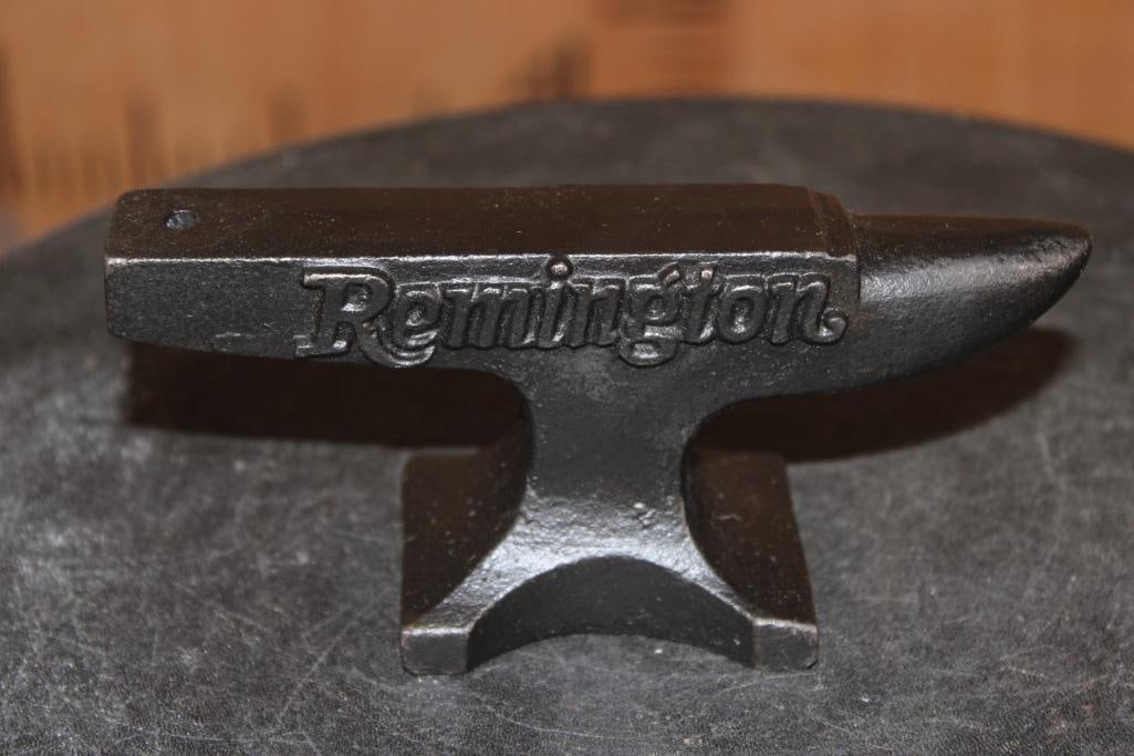 Cast Iron Reproduction "Remington" Gunsmithing Miniature ANVIL: Cast Iron Reproduction "Remington" Gunsmithing Miniature ANVIL. It measures 5 5/8" Long x 2" Wide x 2.5" Tall and Weighs 1 lb 12 oz. GUNSMITHING COLLECTIBLES 