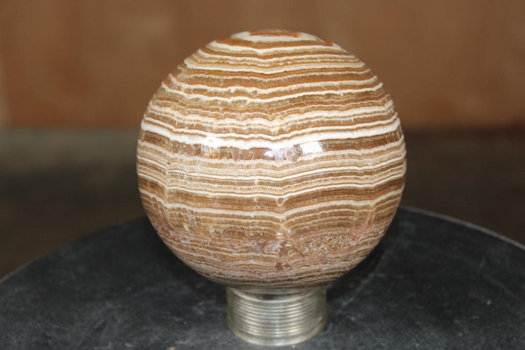 Big BANDED ARAGONITE Mineral Sphere: Big BANDED ARAGONITE Mineral Sphere. It measures 4.5" in Diameter and it Weighs 4 lbs 10 oz. The metal stand is not included. ROCKS FOSSILS MINERALS 