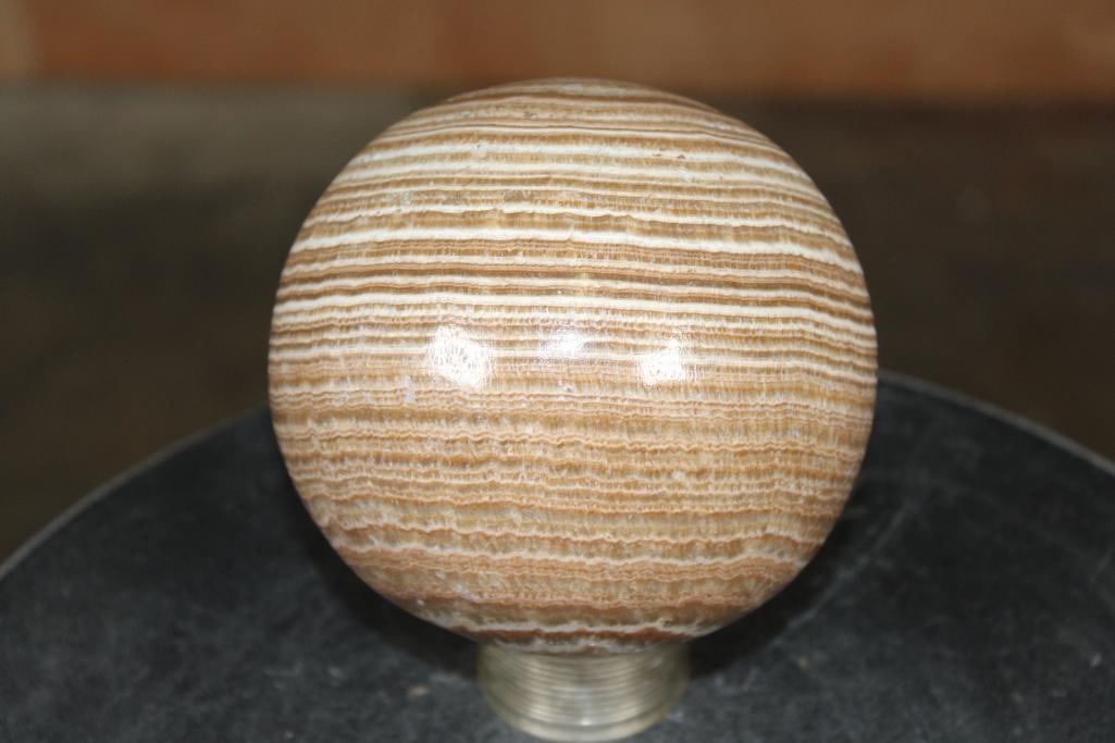 Big BANDED ARAGONITE Mineral Sphere: Big BANDED ARAGONITE Mineral Sphere. It measures 4.75" in Diameter and Weighs 5 lbs 1 oz. The metal stand is not included. ROCKS FOSSILS MINERALS 