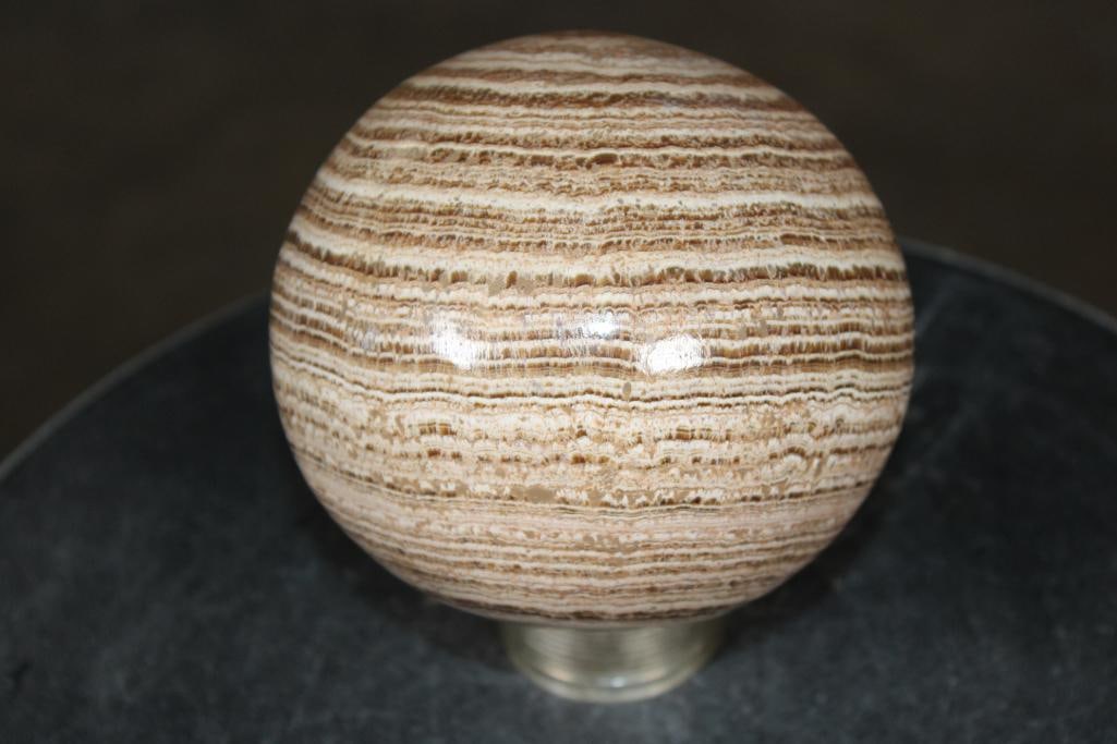 Big BANDED ARAGONITE Mineral Sphere: Big BANDED ARAGONITE Mineral Sphere. It measures 4.5" in Diameter and Weighs 4 lbs 1 oz. The metal stand is not included. ROCKS FOSSILS MINERALS 