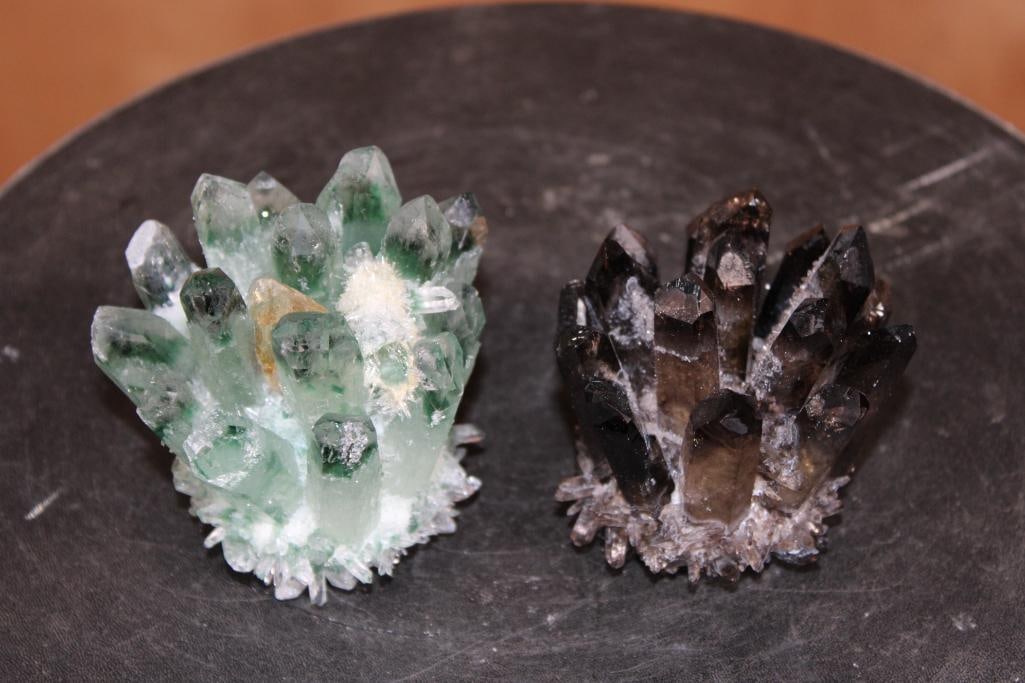 (1) Natural GREEN PHANTOM QUARTZ Cluster and (1) Black SMOKEY QUARTZ Cluster: 1 Natural GREEN PHANTOM QUARTZ Cluster and 1 Black SMOKEY QUARTZ Cluster. The Green Phantom Quartz measures 3.5" Tall x 3.25" Wide. The Black Smokey Quartz measures 3" Tall x 3.25" Wide. The Total Wei