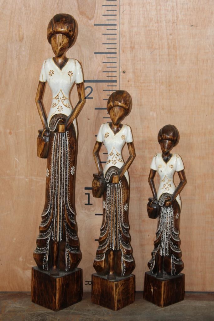 (3) Hand-carved and Hand-painted African Woman Statues: 3 Hand-carved and Hand-painted African Woman Statues. They measure approximately 17" Tall, 23" Tall, and 31" Tall. The Total Weight is 4.95 lbs. COLLECTIBLE AFRICAN ART STATUES AND SCULPTURES 