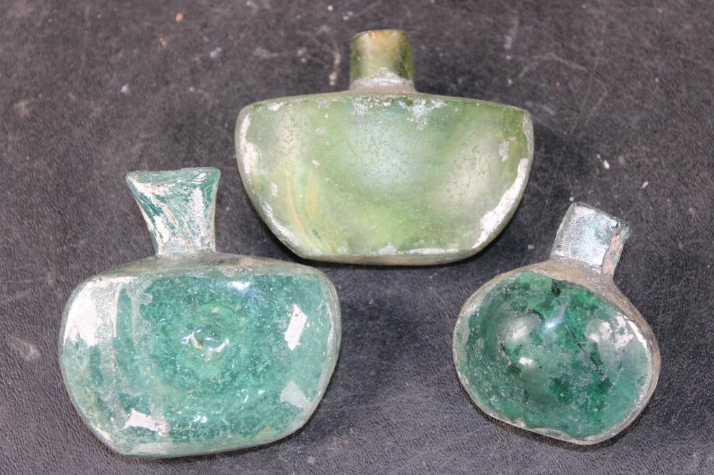 (3) Ancient Roman Glass Bottles from the Roman Empire: 3 Ancient Roman Glass Bottles from the Roman Empire.The Green bottle measures 3.25" Tall x 2.75" Wide. And the Aqua colored Bottles measure 3" Tall x 3" Wide and 2.5" Tall x 2" Wide. The Total Weight