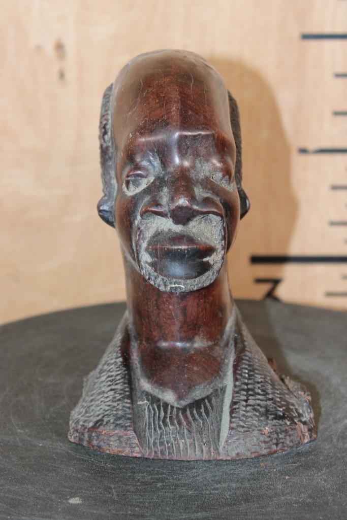 Vintage Hand-carved Wood African Tribal Bust Sculpture: Vintage Hand-carved Wood African Tribal Bust Sculpture. It measures 7" Tall x 4.75" Wide x 4.75" Long and Weighs 2 lbs 6 oz. COLLECTIBLE AFRICAN ART 
