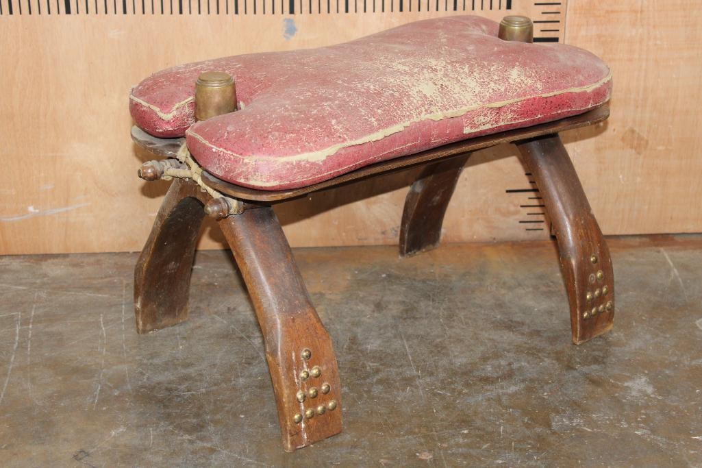 Antique CAMEL SADDLE with Wood and Brass Accents: Antique CAMEL SADDLE with Wood and Brass Accents. It measures 22" Long x 14" Wide x 14" Tall. COLLECTIBLE ANTIQUE FURNITURE 