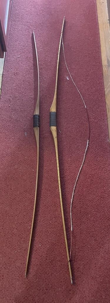 (2) Very Old Wooden BOWS: 2 Very Old Wooden BOWS. One is possibly a Pearson, it has "P3658B 42 # on it and a string. The other has two snakes and designs painted on it (no string). They measure 57.5" and 64" Long. COLLECTIBLE