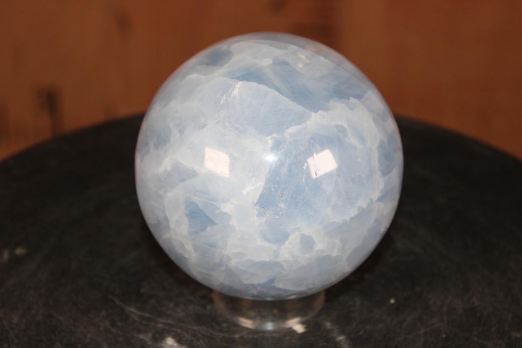 Polished BLUE CELESTITE Sphere with a Ring Stand: Polished BLUE CELESTITE Sphere. It measures 4" in Diameter and Weighs 3.3 lbs. It comes with a plastic Ring Stand for display. ROCKS FOSSILS MINERALS 