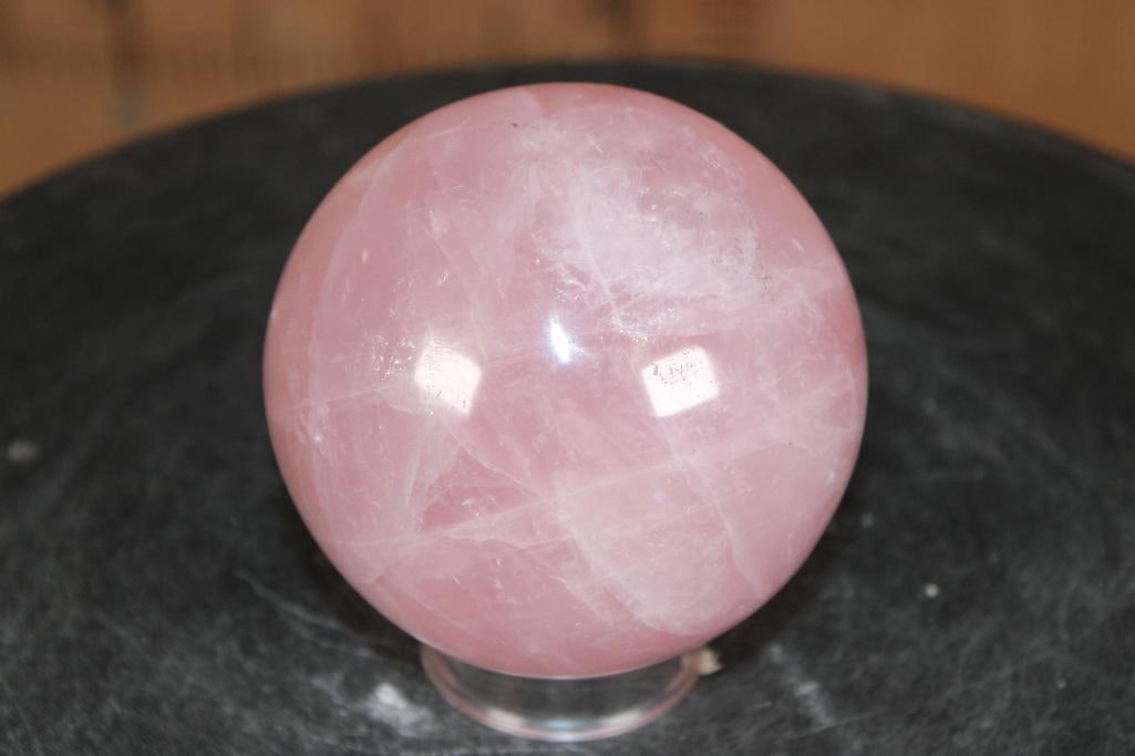 Polished ROSE QUARTZ Mineral Sphere: Polished ROSE QUARTZ Mineral Sphere. It measures 3.5" in Diameter and Weighs 2.05" lbs. It comes with a plasic ring for display. ROCKS FOSSILS MINERALS 