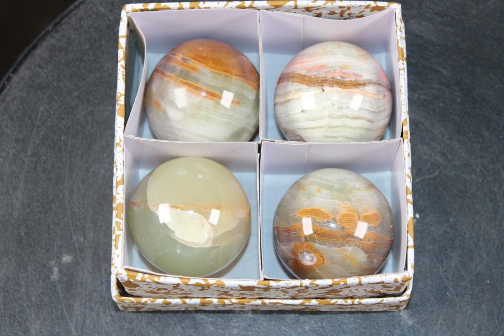 (4) Cut and Polished ONYX Spheres: 4 Cut and Polished ONYX Spheres. They all measure approximately 2" in Diameter and come in the box as shown. This is genuine, natural onyx with varied color and banding patterns. Onyx is used for