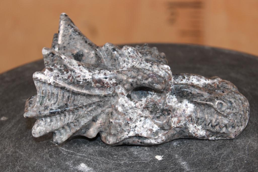 Hand-carved YOOPERLITE or "Flame Stone" Dragon Head that Glows under a UV Light!: Hand-carved and Polished YOOPERLITE Dragon Head. It measures 6" Long x 3" Wide x 3" Tall and Weighs 1.3 lbs. This Yooperlite Dragon Head is pretty fearsome, especially when you shine a UV light on