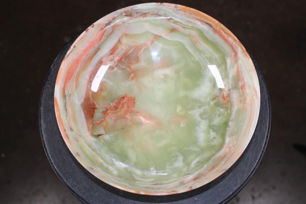 Big BOWL Carved from a Single Piece of GREEN BANDED ONYX: Big BOWL Carved from a single piece of GREEN BANDED ONYX. It measures 9 7/8" Wide x 3" Deep and Weighs 3.3 lbs. Green banded onyx is a naturally banded stone valued for its visual appeal and