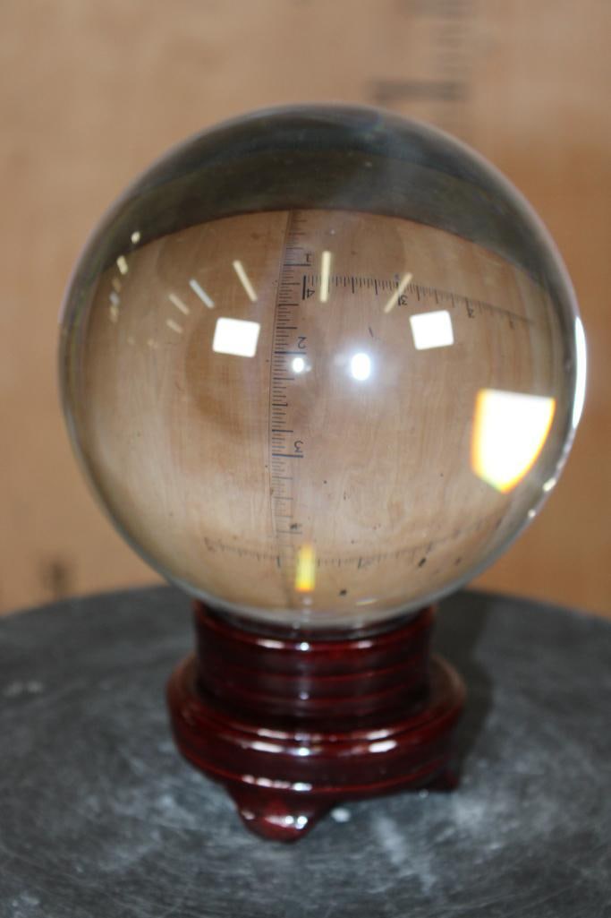 Big "Crystal Ball" Glass Sphere with a Custom Wood Stand: Big "Crystal Ball" Glass Sphere with a Custom Wood Stand. It measures approximately 5.75" in Diameter and Weighs 7 lbs. ROCKS FOSSILS MINERALS 