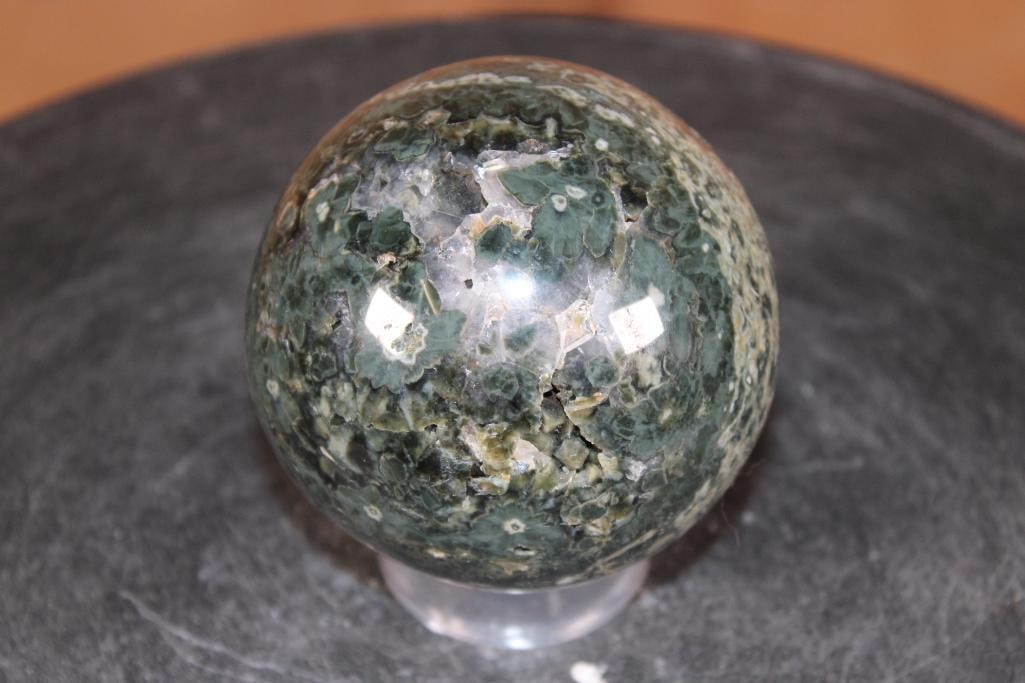 Polished OCEAN JASPER Mineral Sphere with Druzy Inclusions: Stunning Polished OCEAN JASPER Mineral Sphere with Druzy Inclusions. It measures 3.25" in Diameter and Weighs 1.65 lbs. It comes with a plastic ring stand for display. ROCKS FOSSILS MINERALS 
