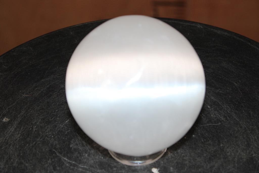 Big Polished SELENITE Mineral Sphere: Big Polished SELENITE Mineral Sphere. It measures 3.75" in Diameter and Weighs 2.2 lbs. It comes with a plastic ring stand for display. ROCKS FOSSILS MINERALS 