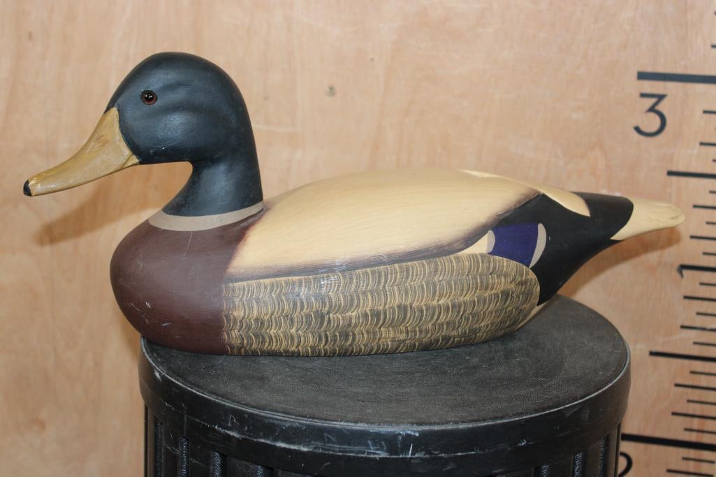 Original Hand-carved James Hadden signed DUCK DECOY: Original Hand-carved and Hand-painted DUCK DECOY signed by James Hadden. It has Glass Eyes and measures 17" Long x 5" Wide x 7 5/8" Tall. Weight 3 lbs 5 oz. There is a minor scuff on the bill, the