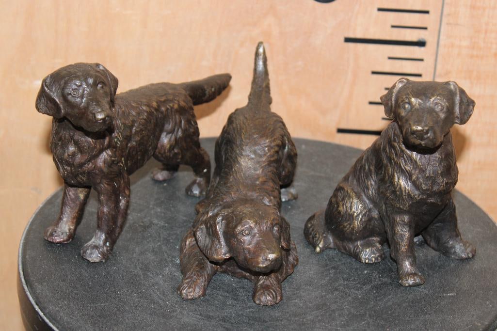 Set of (3) Small Dog BRONZE Sculptures, Weight: 7 lbs: Set of 3 Small Dog BRONZE Sculptures. The standing Dog measures 7" Long, the sitting Dog is 5" Tall and the 3rd Dog is 5" Tall. The Total Weight for all is 7 lbs. COLLECTIBLE BRONZE SCULPTURES 