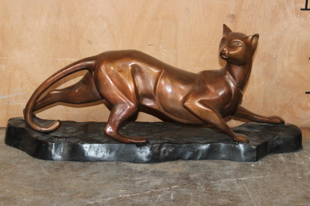 Big Laying CAT Bronze Sculpture, Weight: 10 lbs: Big Laying CAT Bronze Sculpture on a Bronze Base. It measures 25.5" Long x 5.75" Wide x 10" Tall. and the Total Weight is 10 lbs 4 oz. COLLECTIBLE BRONZE ART SCULPTURES 