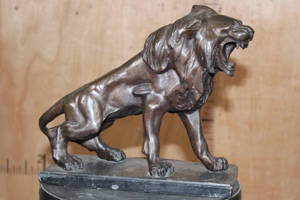 Bronze LION Sculpture on a Marble Base, Weight: 14 lbs: Beautiful and regal LION Bronze Sculpture. It is mounted on a Marble Base and measures 11.5" Long x 11.25" Tall x 5" Wide. The Total Weight is 14 lbs 1 oz. COLLECTIBLE BRONZE SCULPTURES 
