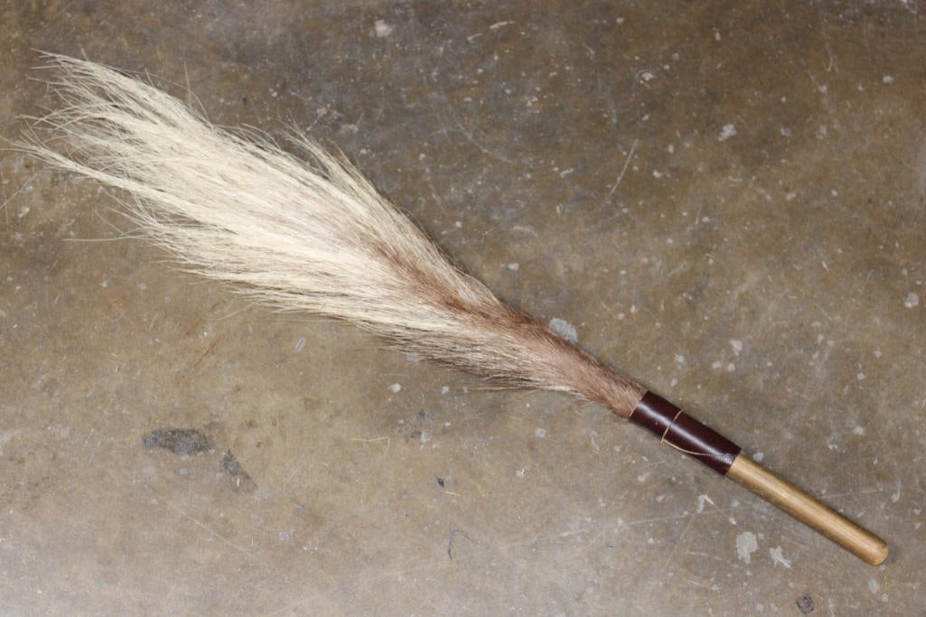 BLACK WILDEBEEST Tail Swatter with a Wood Handle: BLACK WILDEBEEST Tail Swatter with a Wood Handle. It measures 32" Long. TAXIDERMY 