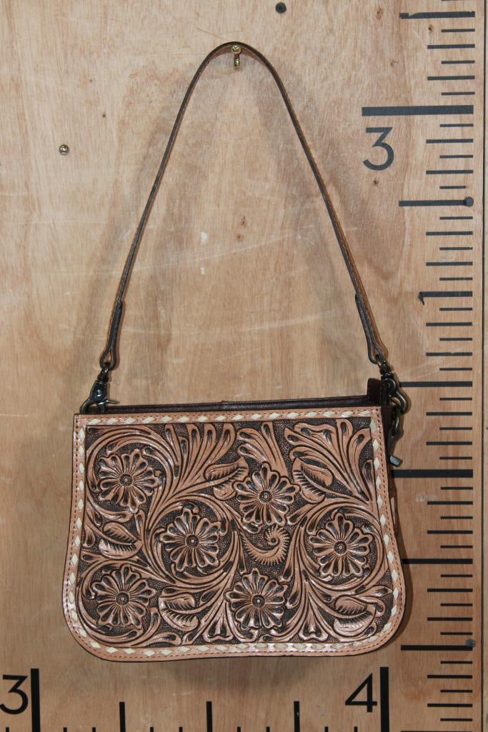 *Brand New* Tooled Flower Leather PURSE or HANDBAG with a Removable Strap: *Brand New* Tooled Flower design Leather PURSE or HANDBAG with a Removable Strap. It measures 10" Long (at the Top Zipper enclosure) x 8" Tall x 3.5" Deep (at the base). There is 1 outside zipper