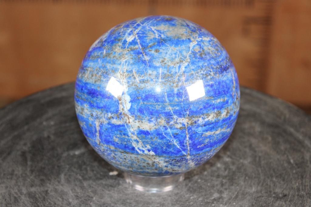 Big Polished BLUE LAPIS LAZULI Mineral Sphere, Weight: 5 lbs: Big Formed and Polished BLUE LAPIS LAZULI Mineral Sphere. It has a 4 5/8" in Diameter and the Total Weight is 5 lbs 8 oz. Lapis Lazuli is a deep blue metamorphic rock used as a semi-precious