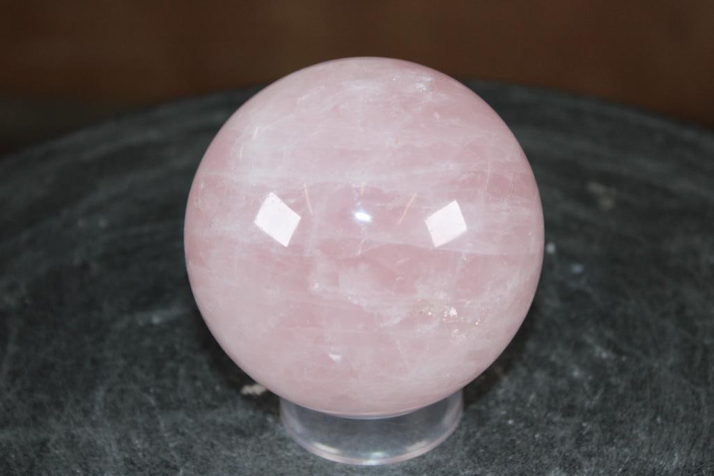 Polished ROSE QUARTZ Mineral Sphere, Weight: 1 lb: Formed and Polished ROSE QUARTZ Mineral Sphere. It measures 3.25" in Diameter and the Total Weight is 1 lb 12 oz. It comes with a plastic ring stand for display. Rose Quartz is known as the "love