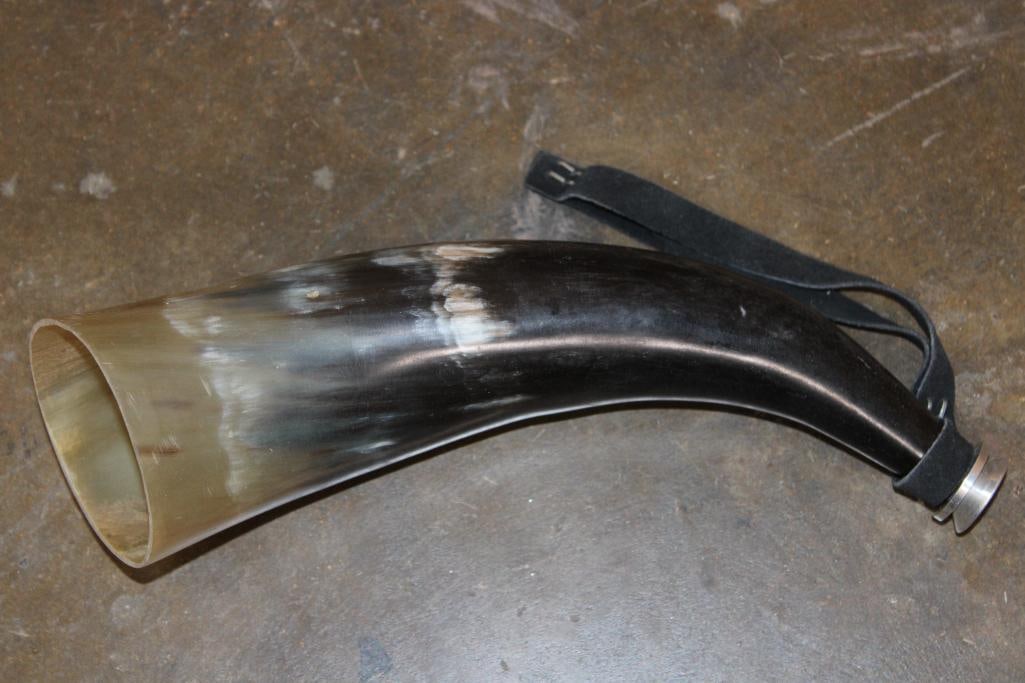 Polished Cow BLOW HORN with a Suede Strap: Polished Cow BLOW HORN. I measures 11.5" around the curve and 2 7/8" in Diameter. TAXIDERMY 