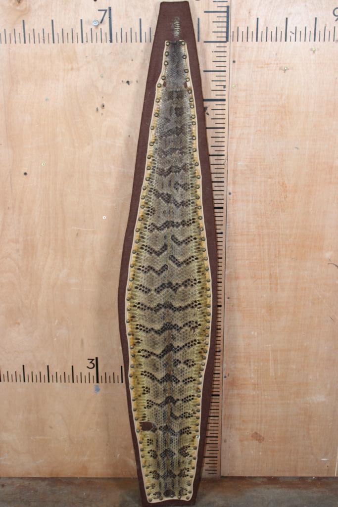 PRAIRIE RATTLESNAKE Skin on a Wood Plank: PRAIRIE RATTLESNAKE Skin on a Wood Plank with its Rattle. The Prairie Rattlesnake measures 56" Long and the Wood Board Plank measures 59" Long. TAXIDERMY SNAKES 