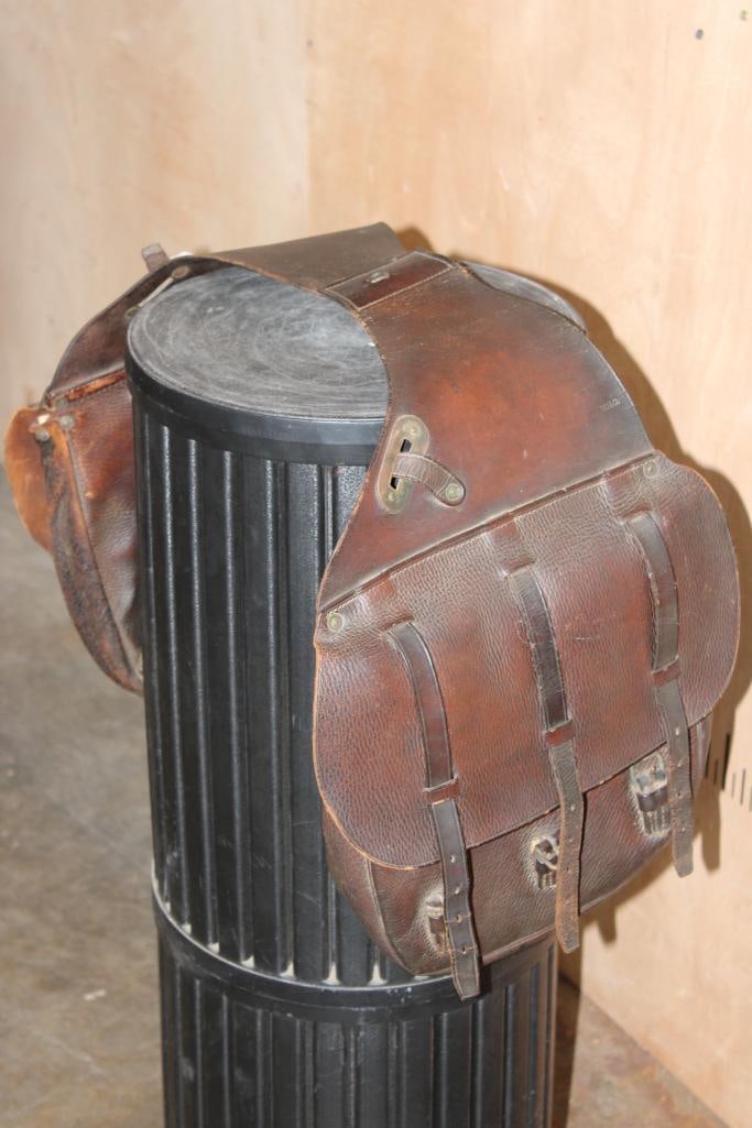 Original WWI U.S. Cavalry McClellan SADDLE BAG made of Leather with Brass Hardware: Original WWI U.S. Cavalry McClellan SADDLE BAG. It is made of Dark Brown Leather and has 3 straps on each bag with Brass Buckles. It is impressed "Clinton 1918 W.H.C" and measures 44" Long x 11"