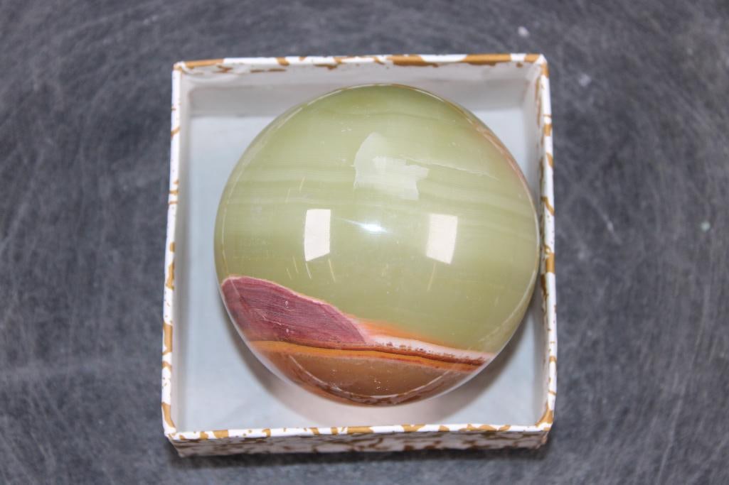 Polished GREEN BANDED ONYX Mineral Sphere, Weight: 1 lb: Formed and Polished GREEN BANDED ONYX Mineral Sphere. It measures 3" in Diameter and the Total Weight is 1 lb 7 oz. Green Banded Onyx is a stunning, translucent, and layered ornamental stone know for