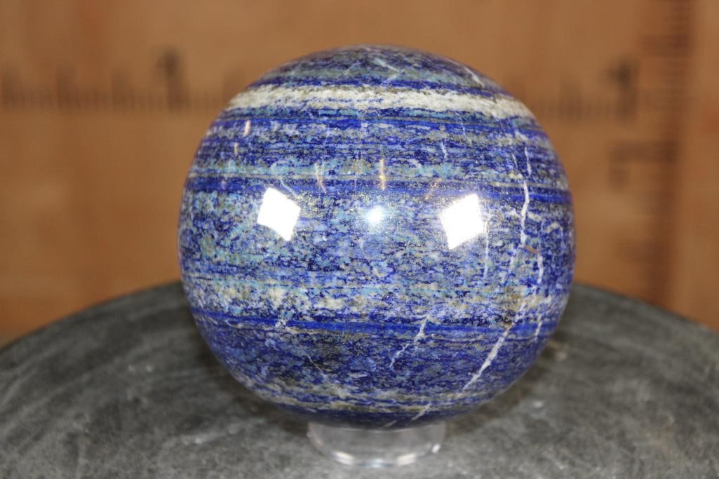 Big Polished BLUE LAPIS LAZULI Mineral Sphere, Weight: 6 lbs: Big Formed and Polished BLUE LAPIS LAZULI Mineral Sphere. It measures 5" in Diameter and the Total Weight is 6 lbs 9 oz. Lapis Lazuli is a deep blue metamorphic rock used as a semi-precious