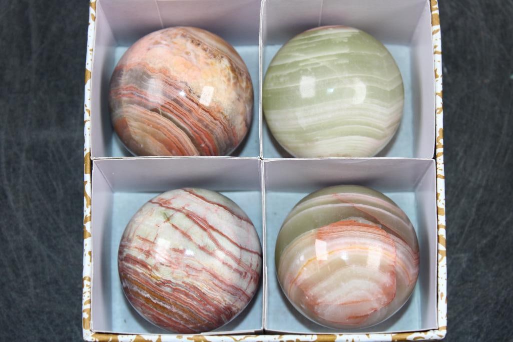 (4) Polished ONYX Mineral Spheres, Weight: 1 lb: 4 Formed and Polished BANDED ONYX Mineral Spheres. They all measure approximately 2" in Diameter and the Total Weight is 1 lb 8 oz. Banded Onyx is a sedimentary stone composed of banded calcite and