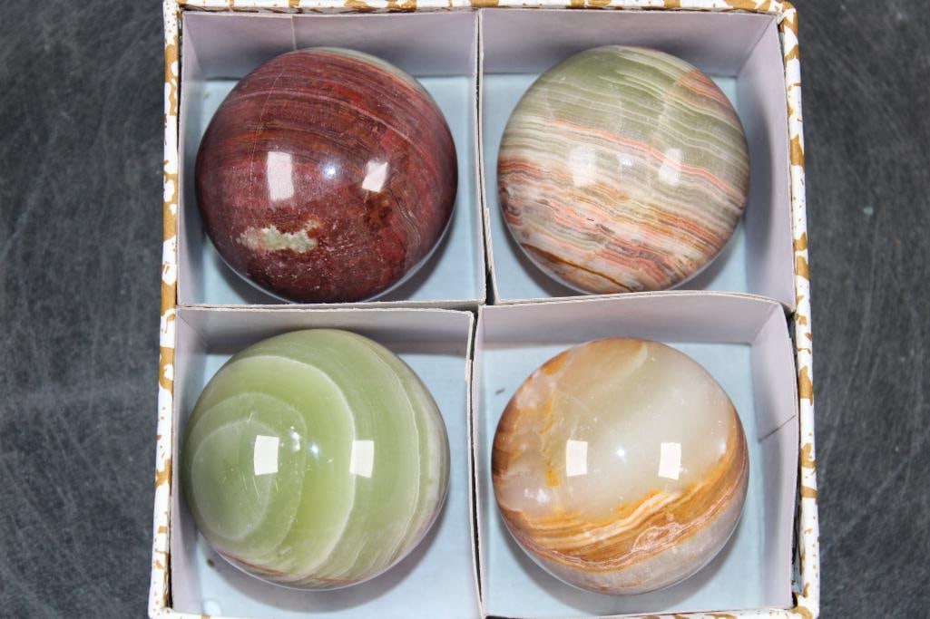 (4) Polished ONYX Mineral Spheres, Weight: 1 lb: 4 Formed and Polished BANDED ONYX Mineral Spheres. They all measure approximately 2" in Diameter and the Total Weight is 1 lb 8 oz. Banded Onyx is a sedimentary stone composed of banded calcite and