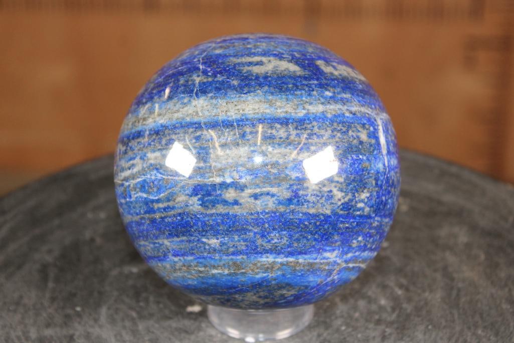 Big Polished BLUE LAPIS LAZULI Mineral Sphere, Weight: 5 lbs: Big Formed and Polished BLUE LAPIS LAZULI Mineral Sphere. It measures 4.5" in Diameter and the Total Weight is 5 lbs 4 oz. Lapis Lazuli is a deep blue metamorphic rock used as a semi-precious