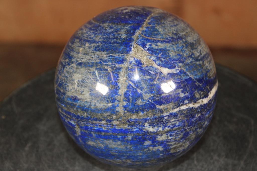 Polished XL BLUE LAPIS LAZULI with PYRITE Mineral Sphere, Weight: 9 lbs: XL Formed and Polished BLUE LAPIS LAZULI with PYRITE Mineral Sphere . It measures 5 3/8" in Diameter and the Total Weight is 9 lbs 9 oz. Lapis Lazuli is a deep blue metamorphic rock