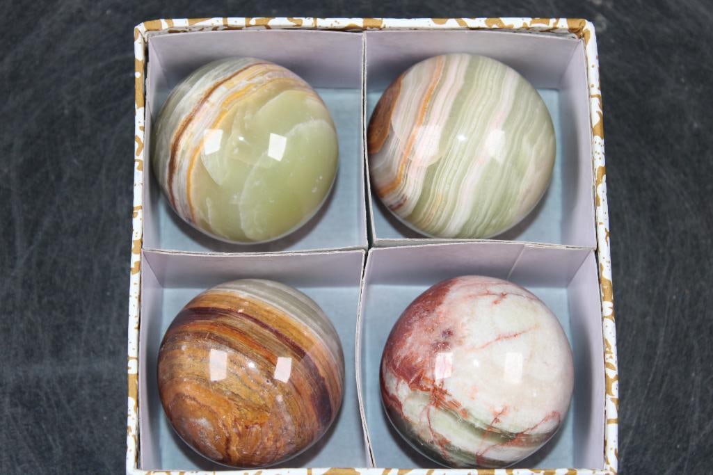 (4) Polished BANDED ONYX Mineral Spheres, Weight: 1 lb: 4 Formed and Polished BANDED ONYX Mineral Spheres. They all measure approximately 2" in Diameter and the Total Weight is 1 lb 8 oz. Banded Onyx is a sedimentary stone composed of banded calcite and